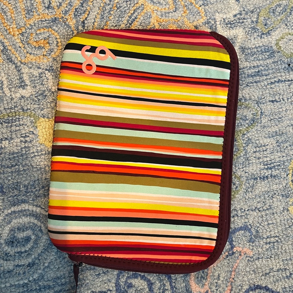 Colorful striped I pad sleeve. About 8inx10in. Machine washable and durable.